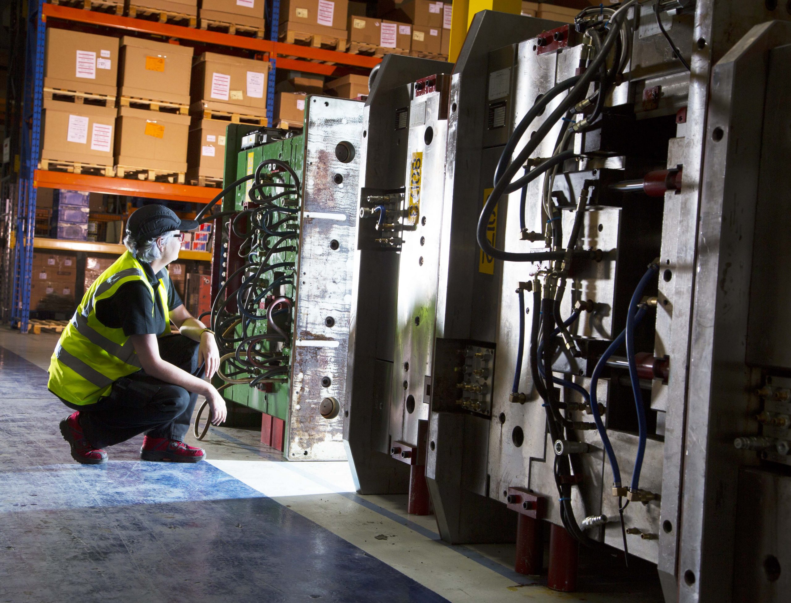 Colleague looking at large offshore tool