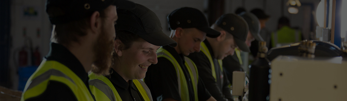 Colleagues working on the assembly line